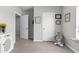 Neutral room with light wood floors and convenient access to other rooms at 14532 Whitewater Way, Brooksville, FL 34604