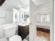 Bathroom with mirror, cabinet, and doorway view to bedroom at 147 114Th Ne Ave # 147, St Petersburg, FL 33716