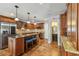 Well-equipped kitchen with stainless steel appliances, granite countertops, and a spacious center island at 150 Bosphorous Ave, Tampa, FL 33606