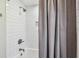 Bathroom shower with subway tile, brushed metal fixtures, and a built-in soap dish at 150 Bosphorous Ave, Tampa, FL 33606