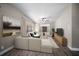 Inviting living room features a comfortable sectional sofa, wood floors and stylish decor at 1501 Howard Pl, Largo, FL 33770