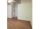 Neutral bedroom features plush carpet and vaulted ceilings for a peaceful and airy ambiance at 1605 Send Way, Lutz, FL 33549