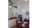 Bright dining room with stylish decor, tall ceilings, and views into other living spaces with lots of natural light at 1605 Send Way, Lutz, FL 33549