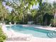 Enjoy a refreshing swim in the community pool with ample seating and a spa at 1605 Send Way, Lutz, FL 33549
