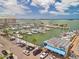 Scenic harbor view featuring boat docks, waterfront dining, and vibrant coastal community atmosphere at 1841 Douglas Ave, Dunedin, FL 34698
