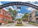 Charming street view showcases local shops and restaurants beneath a welcoming 