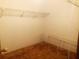 A walk-in closet with shelving and ample storage space at 20989 Negril, Lutz, FL 33558