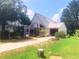 Charming two-story home with a screened porch and well-maintained landscaping at 20989 Negril, Lutz, FL 33558