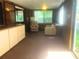 Bright living room featuring comfortable seating, natural light, and views of the outdoors at 20989 Negril, Lutz, FL 33558