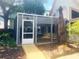 Enclosed screened porch offering a relaxing outdoor space at 20989 Negril, Lutz, FL 33558