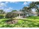 Backyard with brick patio and seating outside the property at 2222 Westchester Blvd, Spring Hill, FL 34606
