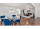 Open floor plan with dining area leading into the living room at 2222 Westchester Blvd, Spring Hill, FL 34606