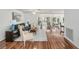 Bright and open living room with hardwood floors and lots of natural light at 2222 Westchester Blvd, Spring Hill, FL 34606