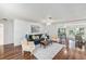 Cozy living room with modern furnishings and view into dining area at 2222 Westchester Blvd, Spring Hill, FL 34606