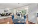 Bright open concept living and dining areas with hardwood floors at 2222 Westchester Blvd, Spring Hill, FL 34606