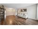 Bright living room with hardwood floors, modern lighting, and tasteful decor at 2461 Rhodesian Dr # 47, Clearwater, FL 33763