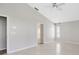 Bedroom with tile floors and ceiling fan showcasing natural light at 25101 Hyde Park Blvd, Land O Lakes, FL 34639