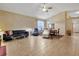 The Living Room showcases furnishings with tile floors and natural light, perfect for gatherings at 25101 Hyde Park Blvd, Land O Lakes, FL 34639