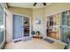 Enclosed patio with access to the dining room and living room through sliding glass doors at 26343 Whirlaway Ter, Wesley Chapel, FL 33544