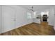 View of the home's entry into the living room and renovated kitchen with breakfast bar at 2700 Bayshore Blvd # 5307, Dunedin, FL 34698