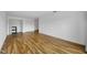 Bright and airy living room featuring wood-look floors and closet space for storage at 2700 Bayshore Blvd # 5307, Dunedin, FL 34698