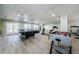 Spacious recreation room with foosball table, pool table, seating area, and exercise equipment at 2700 Bayshore Blvd # 5307, Dunedin, FL 34698