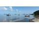 Scenic waterfront view showcasing several boats on the water with blue skies and picturesque clouds at 2700 Bayshore Blvd # 5307, Dunedin, FL 34698