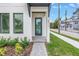 Close-up of the front door, showcasing modern design and landscaping at 2812 N Massachusetts Ave, Tampa, FL 33602