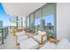 Relax on this spacious balcony, offering cityscape views and comfortable outdoor seating at 301 1St S St # 1906, St Petersburg, FL 33701