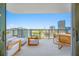 Spacious balcony with city views, offering a relaxing outdoor space with comfortable seating at 301 1St S St # 1906, St Petersburg, FL 33701