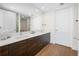 Sleek bathroom with double sinks, stylish vanity, and walk-in shower at 301 1St S St # 1906, St Petersburg, FL 33701