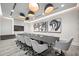 Modern conference room with large table, comfortable seating, and stylish lighting at 301 1St S St # 1906, St Petersburg, FL 33701