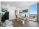 Bright home office with large windows, modern desk setup, and city views at 301 1St S St # 1906, St Petersburg, FL 33701