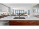 Open-concept kitchen with sleek countertops, modern fixtures, and a seamless flow to the living area at 301 1St S St # 1906, St Petersburg, FL 33701
