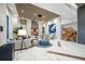 Bright lobby with elegant furnishings, modern art, unique lighting fixture, and stylish decor at 301 1St S St # 1906, St Petersburg, FL 33701