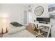 Bright office with a comfy chair, modern desk, wall art, and wood flooring that compliments the aesthetic at 301 1St S St # 1906, St Petersburg, FL 33701
