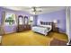 Spacious bedroom with bright light, large bed, and antique furniture set at 321 Belle View Ave, Temple Terrace, FL 33617