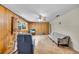 Living room featuring light walls and wood paneling with lots of space at 321 Belle View Ave, Temple Terrace, FL 33617