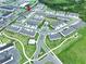 Aerial view of a residential area with townhomes, green spaces, and community amenities at 32451 Limitless Pl, Wesley Chapel, FL 33545