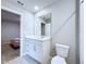 Bathroom with a white vanity, neutral walls, and tile floors for a clean, modern look at 32451 Limitless Pl, Wesley Chapel, FL 33545
