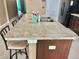 Kitchen island features a large countertop and sink at 3313 San Moise Pl, Plant City, FL 33567