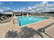 Community pool with lounge chairs, perfect for residents to relax and enjoy at 3313 San Moise Pl, Plant City, FL 33567