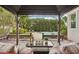 Backyard deck featuring seating and landscaping, with views of the in-ground swimming pool at 333 30Th N Ave, St Petersburg, FL 33704