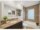 Bathroom featuring granite countertops, mosaic tile, bathtub, shower, and large mirror at 333 30Th N Ave, St Petersburg, FL 33704