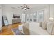 Bright bedroom with hardwood floors, transom windows, and access to an outdoor balcony at 333 30Th N Ave, St Petersburg, FL 33704