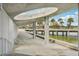 Unique architectural design along a pier walkway with views of palm trees and water at 333 30Th N Ave, St Petersburg, FL 33704