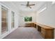 Office with large desk, transom windows providing natural light and a view to the outside at 333 30Th N Ave, St Petersburg, FL 33704