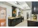 Updated kitchen with granite countertops, stainless steel appliances, dark wood cabinets, and ample storage space at 333 30Th N Ave, St Petersburg, FL 33704