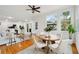 Bright and open living area with hardwood floors, plenty of natural light, and a view to the dining room at 333 30Th N Ave, St Petersburg, FL 33704
