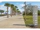 Picturesque scene of the St. Pete Pier walkway, adorned with palm trees and clear skies at 333 30Th N Ave, St Petersburg, FL 33704